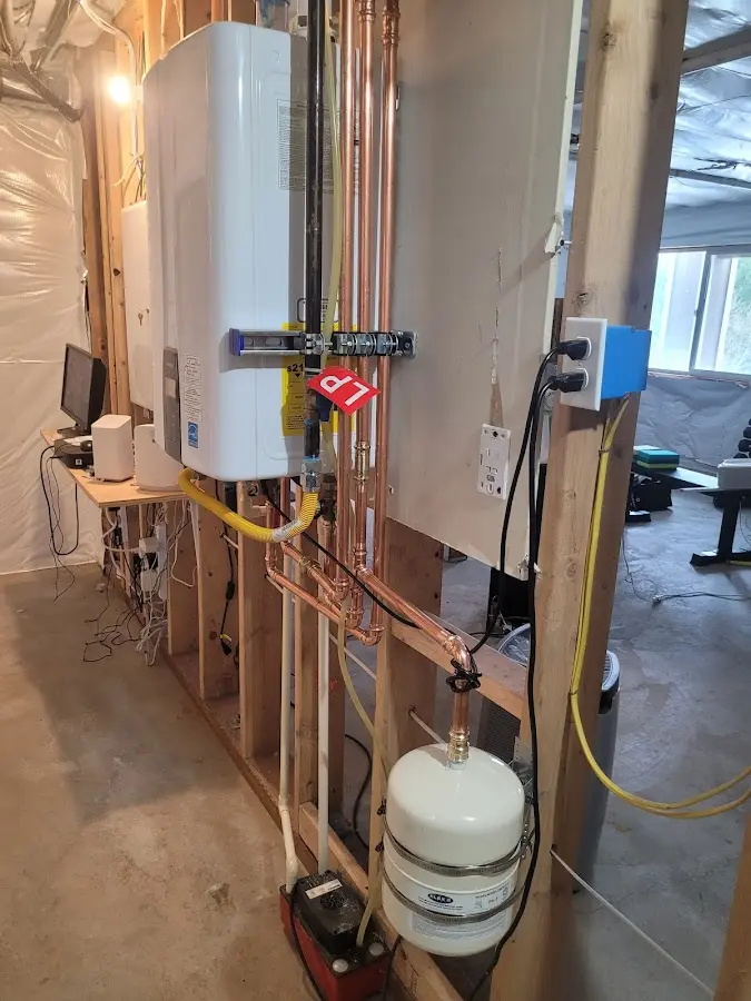 Licensed plumber repairing a kitchen sink in Lansdale